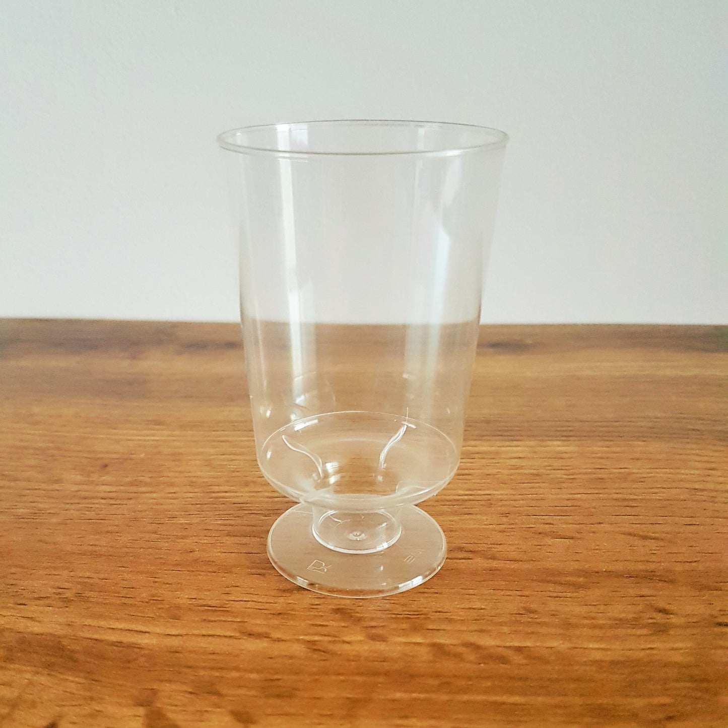 Trinkglas mit Fuß Plastik 100ml - 600 st.